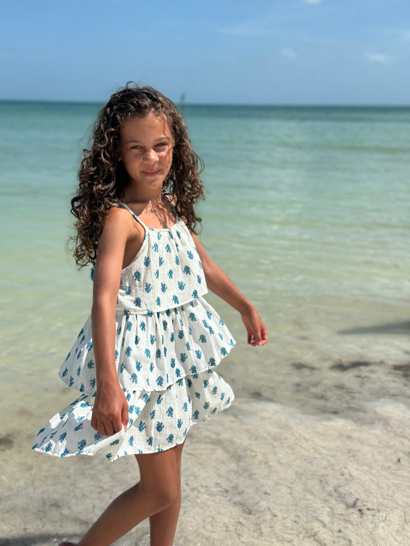 Flapper-style tiered summer dress in white and turquoise floral fabric