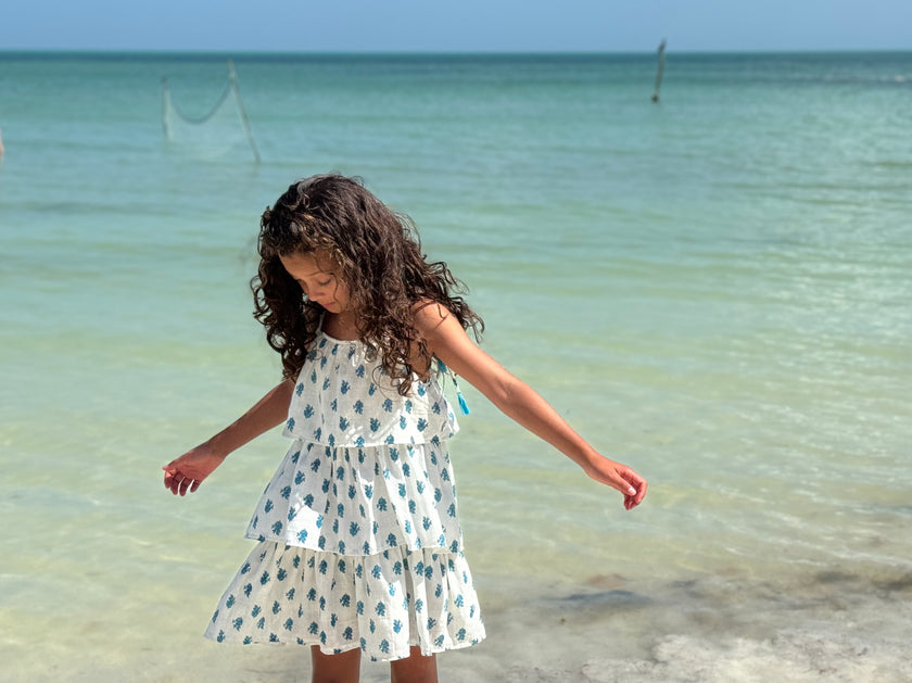 Flapper-style tiered summer dress in white and turquoise floral fabric